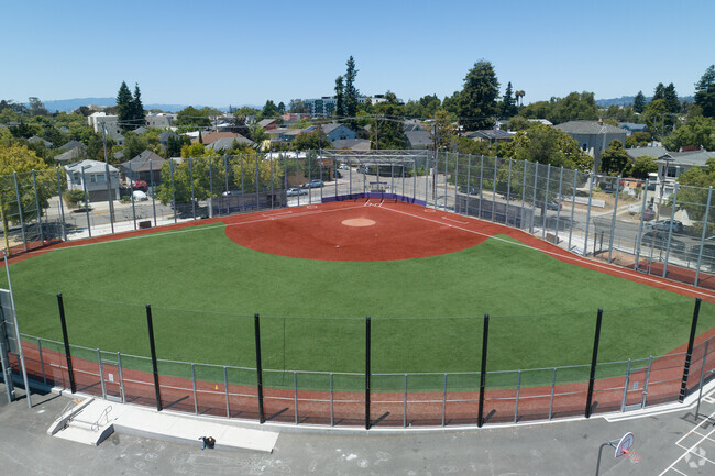 Kids love the new baseball diamond at Emerson Elementary School in Oakland.
