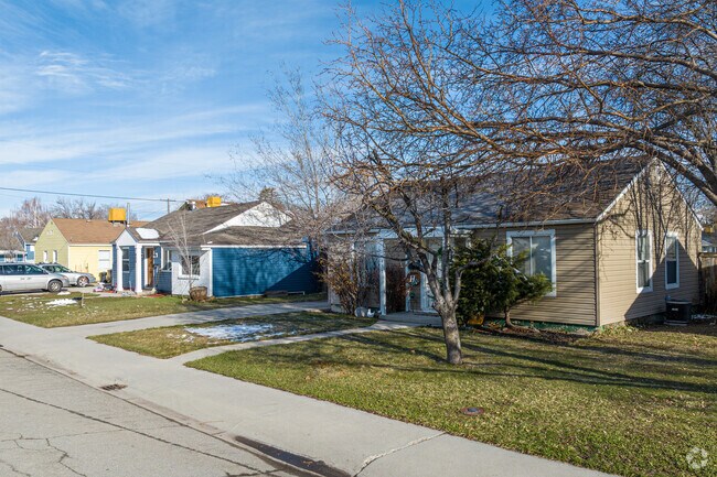 Beautifully manicured lawns add charm to homes in Provo’s Foot Hills community.