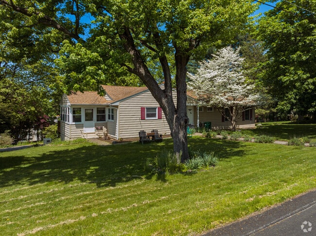 Shaded single-family homes are common throughout Goshen neighborhoods.