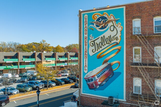 Admire the colorful mural honoring Trolley Square near Cool Spring-Tilton Park.