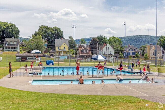 Residents of the Far West community enjoying a day of sun at the Recreation Park pool.