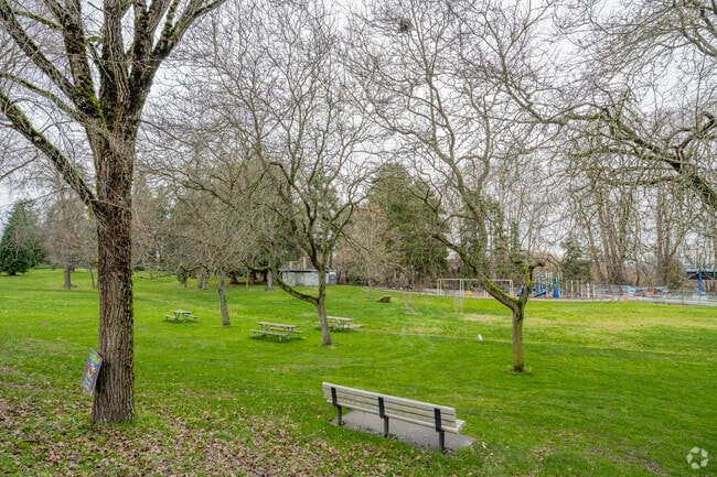 Families enjoy open space and lakeside breezes at Be'er Sheva Park.