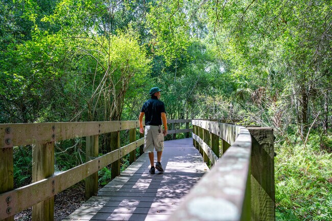 Locals enjoy the serene boardwalks at Largo Central Park Nature Preserve.
