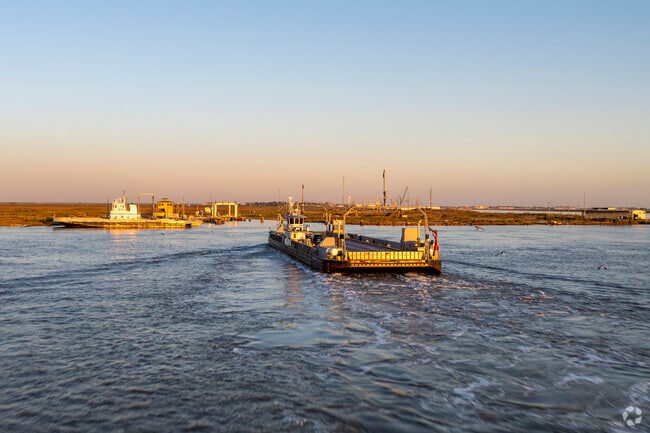 The Cameron Ferry II shuttles drivers across the Calcasieu River in and out of Cameron.