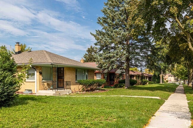 Beautiful lawns and mature trees can be found in Columbus Park.