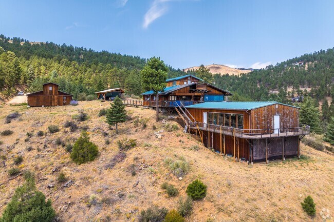 Many single family homes in Crisman resemble rustic cabins with large picture windows.