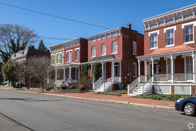 Italianate-style homes with decorative corbels offer functionality mixed with luxury.