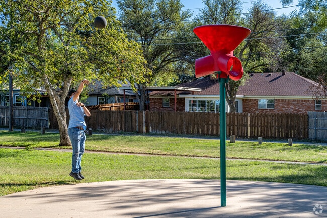 Locals test their basketball skills at Unidad Park in San Angelo, Texas.
