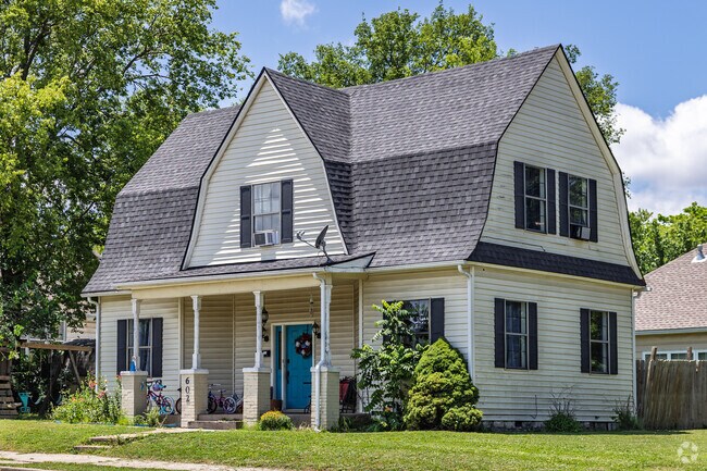 A stately Dutch Colonial style home is a great example of the variety in architecture found in Gray.