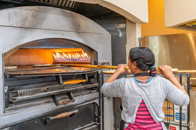 Get fresh baked bread at Mediterranean Bakery and Cuisine in Arden Manor.