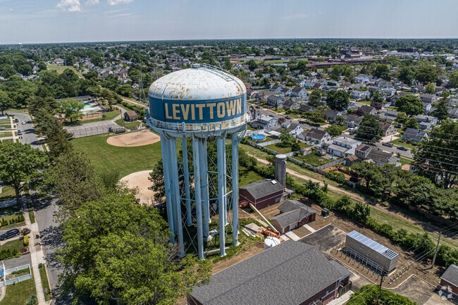 Levittown water tower stands proud at Azalea Road Pool.