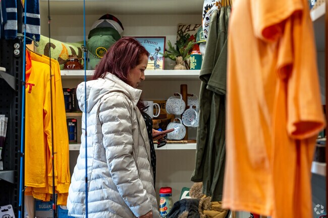 Shop for cabin-themed home furnishings at Rough Riders Cafe in Bolles Harbor.