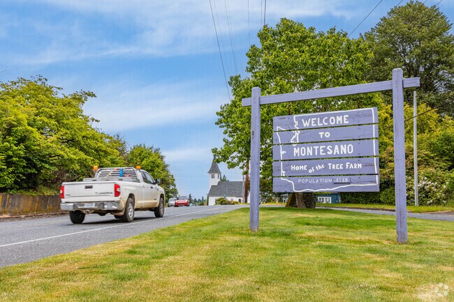 Residents of Montesano are greeted by numerous signs with warm messages as they enter town.