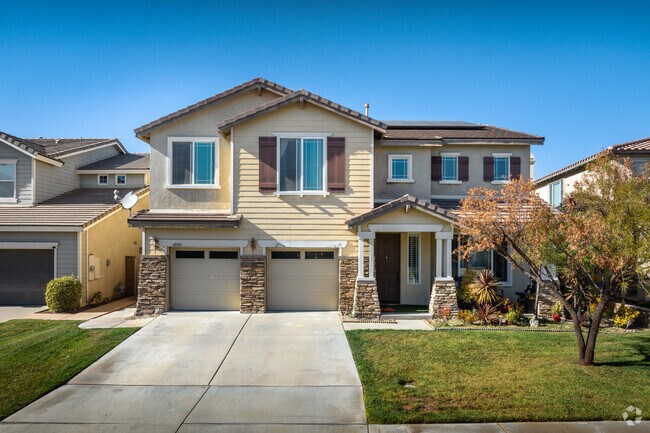 Blue skies are seen over a home in Wolf Creek.