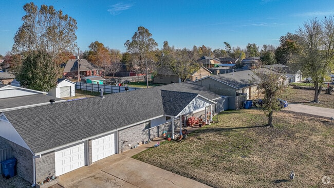 A row of charming ranch-style homes line a street in Newcastle.