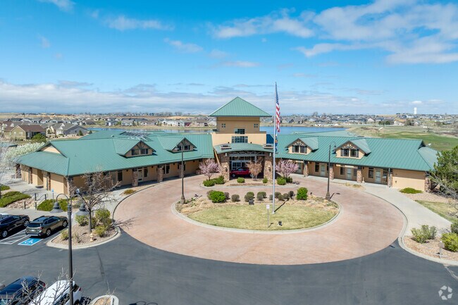 The 33,000-square-foot clubhouse at Todd Creek Golf Club features a pro shop, fitness center, and indoor pool, enhancing the golfing experience.