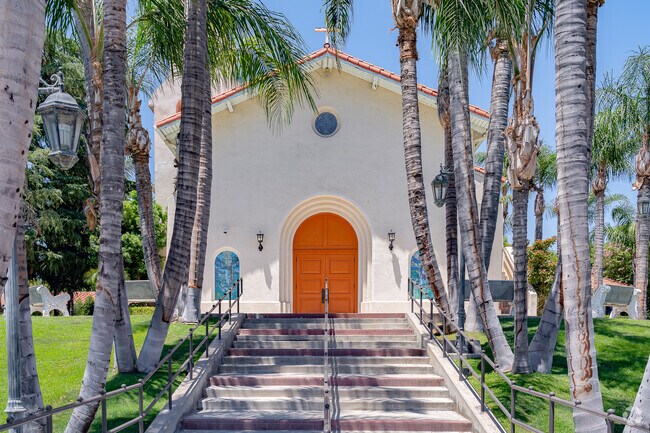 The entrance to Our Lady of Perpetual Help School features a long stairway.