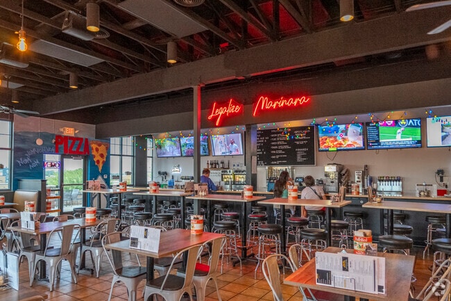 North Mr. Pizza offers cheesy chicken pizza perfect for movie nights.