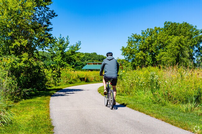 South Farnsworth bike riders can enjoy paved roads that run through lush greenery.