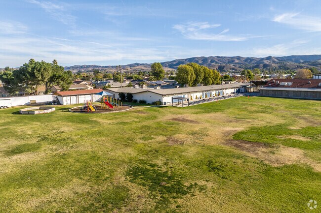 There is a large grass area to play at St Rose of Lima Catholic Elementary School.