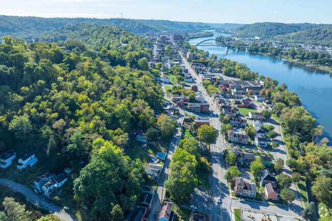 The North Wheeling neighborhood sits between tree covered mountain ridges and the Ohio River.
