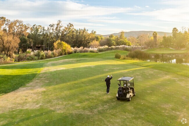 Locals enjoy the scenery at Wood Ranch Country Club at sunset.