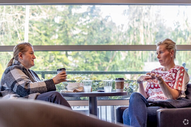 Two friends catch up over one of many Queen Bee favorites.