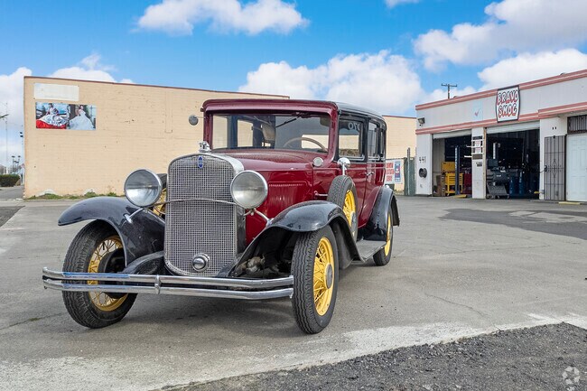 Bravo Smog displays classic cars along the main street in Chowchilla.