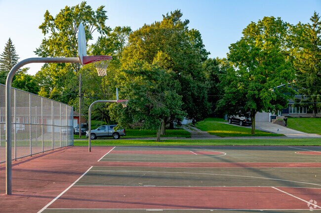 Exchange Park features two full-sized basketball courts for local pickup games.