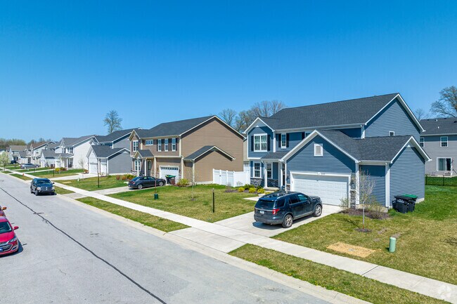 A row of newer built homes that tend to be a bit larger than the classic home of North Portage.