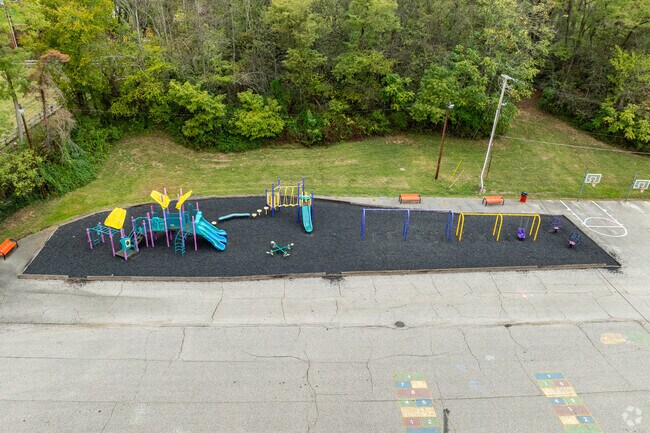 A playground in the rear of Jefferson Avenue Elementary School is a fun place for students.