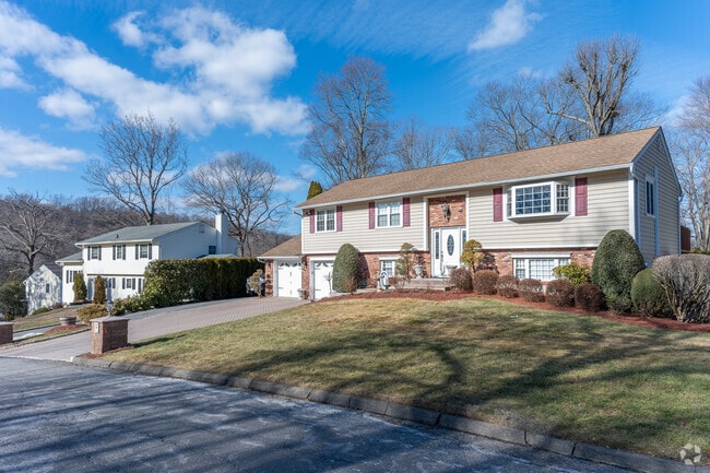 Hilly blocks and winding subdivisions in Yorktown Heights are lined with single-family homes built from the mid-1900s through the 2020s.