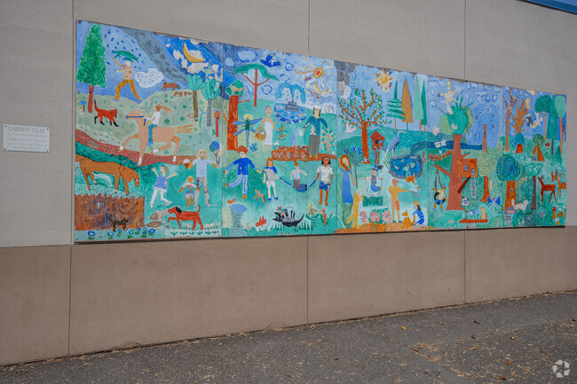 The 'Garden Play' mural was made by students at Cedar Mill Elementary School in Portland.