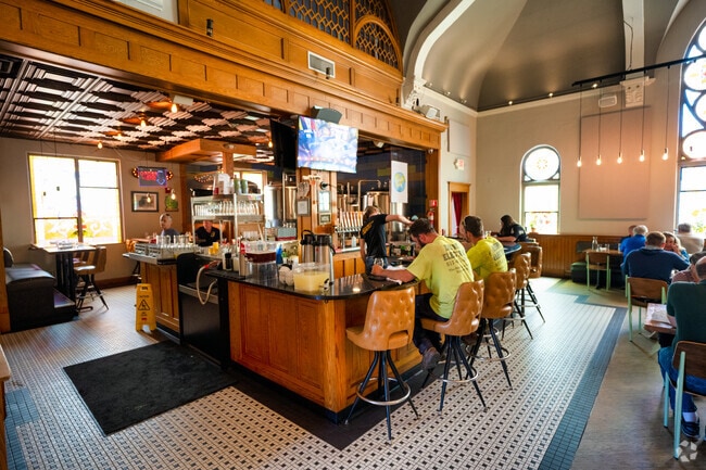 Grab a beer at the bar of Salt Springs Brewery, located near the South Side.