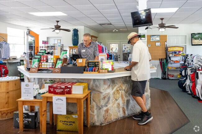 The pro shop at Golf Hammock has an assortment of golfing supplies and wardrobe available.