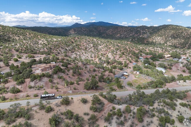 Homes in Cañoncito are spread out spaciously through the beautiful desert landscape.