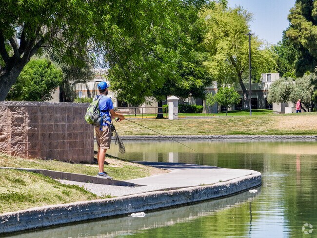 Locals can spend an entire afternoon fishing at Dobson Ranch Lake.