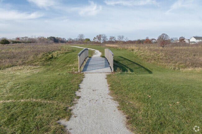 Shagbark Recreation Area visitors walk on scenic paths.