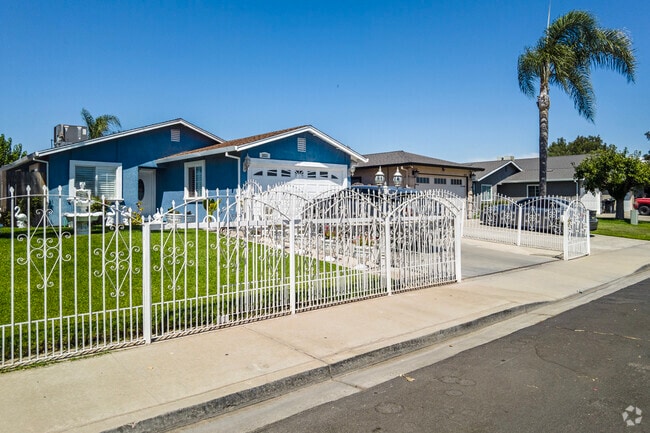 Decorative fences line several of  the yards in the City of  Riverbank.