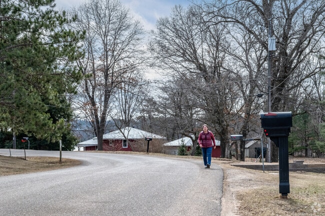 Seymour residents enjoy a stroll through the neighborhood.