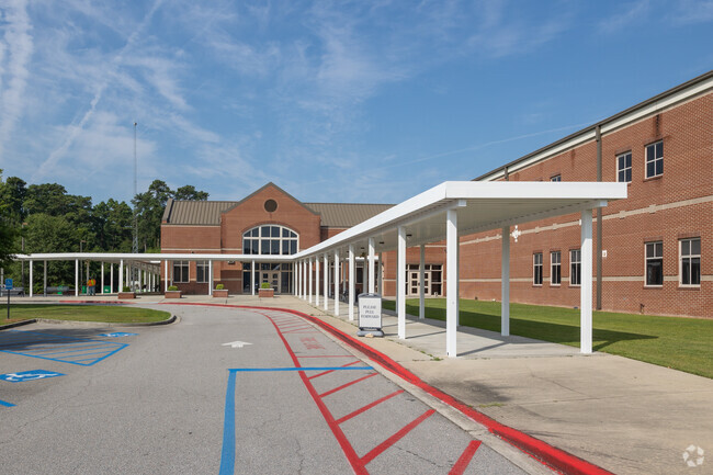 Dent Middle School in Columbia has drop off and pick up areas.