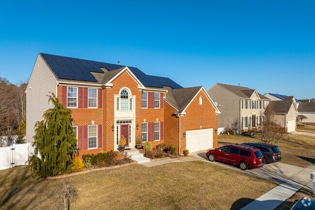 Newer traditional style homes in Northfield often have large yards and attached garages.