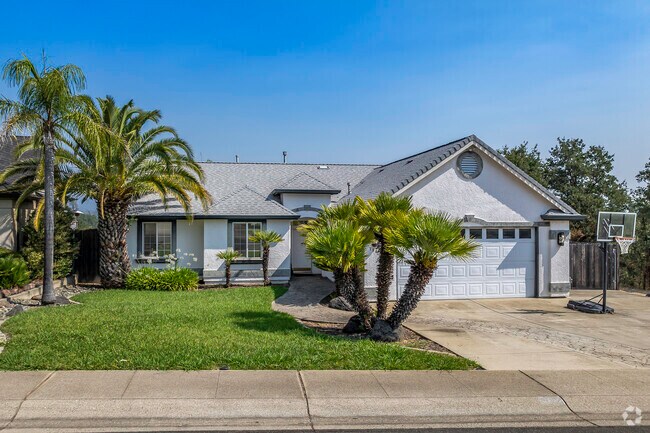 This Contemporary Craftsman style home has stucco siding in Twinview.