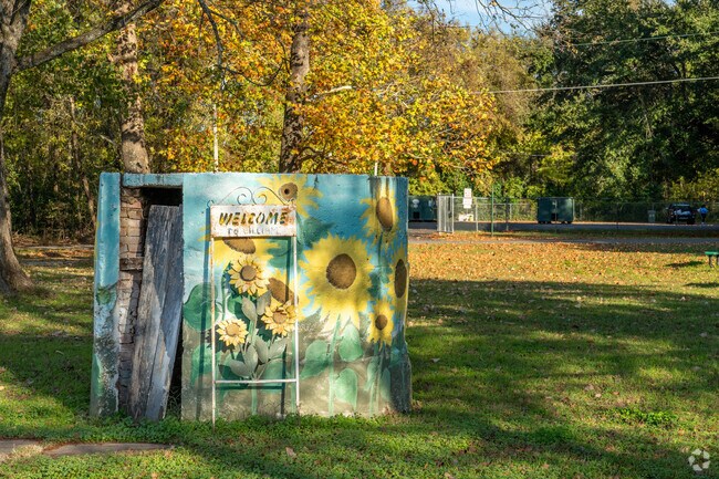 Ida-Hosston’s local library features a colorful sunflower mural outside.