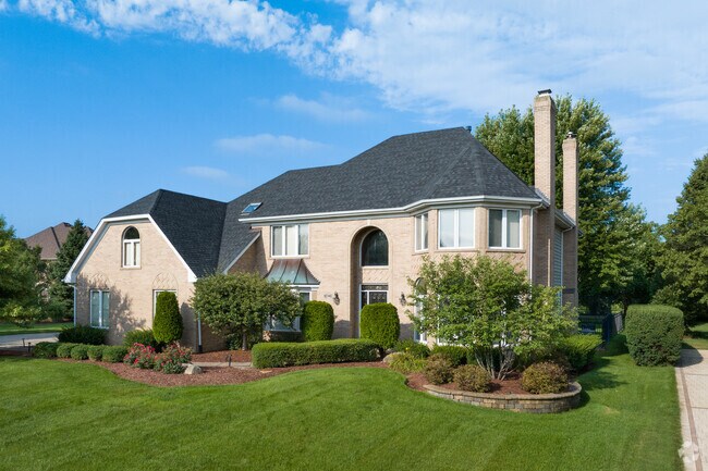 Stunning newer brick homes line the streets of Tamarack in Naperville.