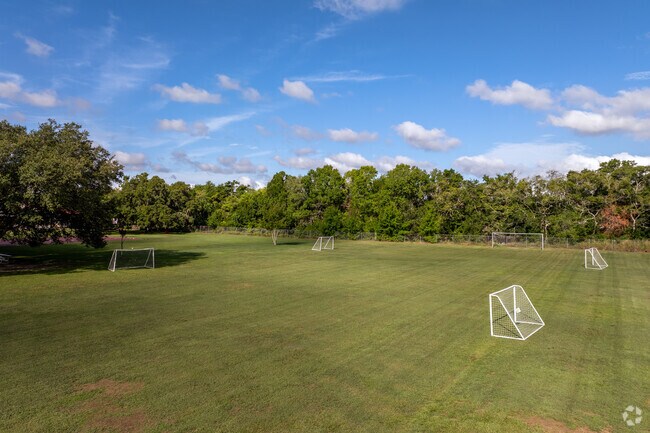 A large soccer field is situated on the east side of St. Thomas Aquinas.
