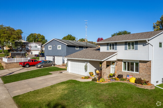 Split-level contemporary homes with two car garages can be found in North Side.