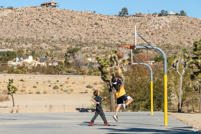 Locals of Yucca Valley shoot hoops and enjoy friendly games at Community Center Park.