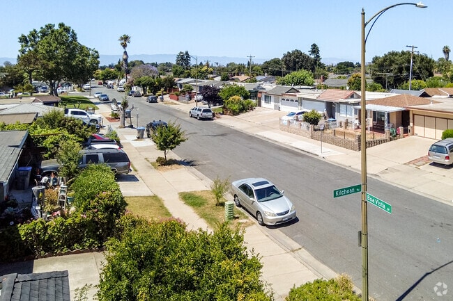 Mid-century flat-roof home styles intermix with more common gabled roofs in Yerba Buena.
