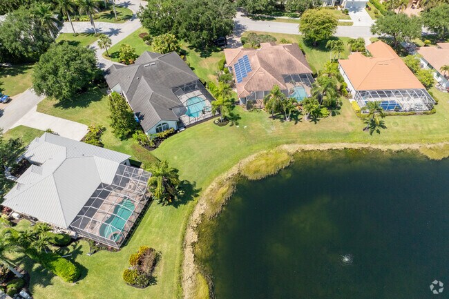 Many homes in Longshore Lakes have eclosed sun rooms and private pools.